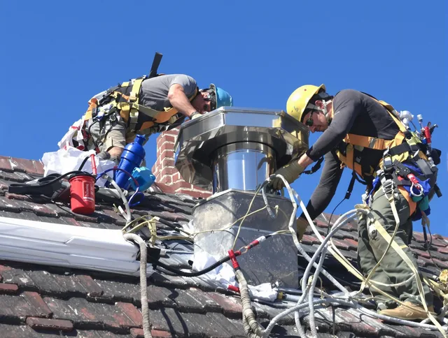Protective chimney cap installed by Gainesville Chimney Sweep in Gainesville, FL