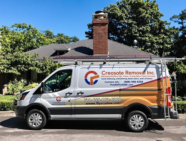 Gainesville Chimney Sweep technician removing creosote safely in Gainesville, FL