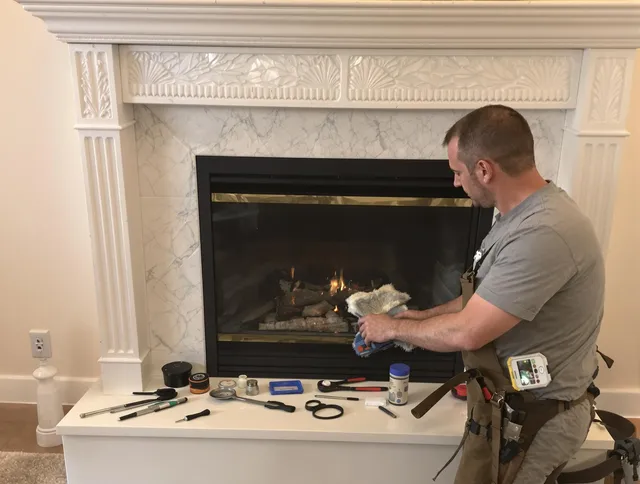 Gainesville Chimney Sweep performing fireplace maintenance in Gainesville, FL